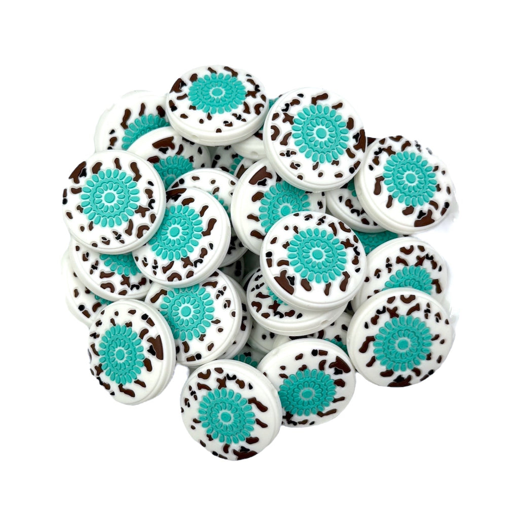 Western circle beads with turquoise center and cow print boarder.